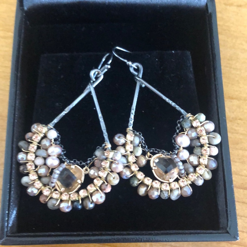 Pair of warm gold toned earrings